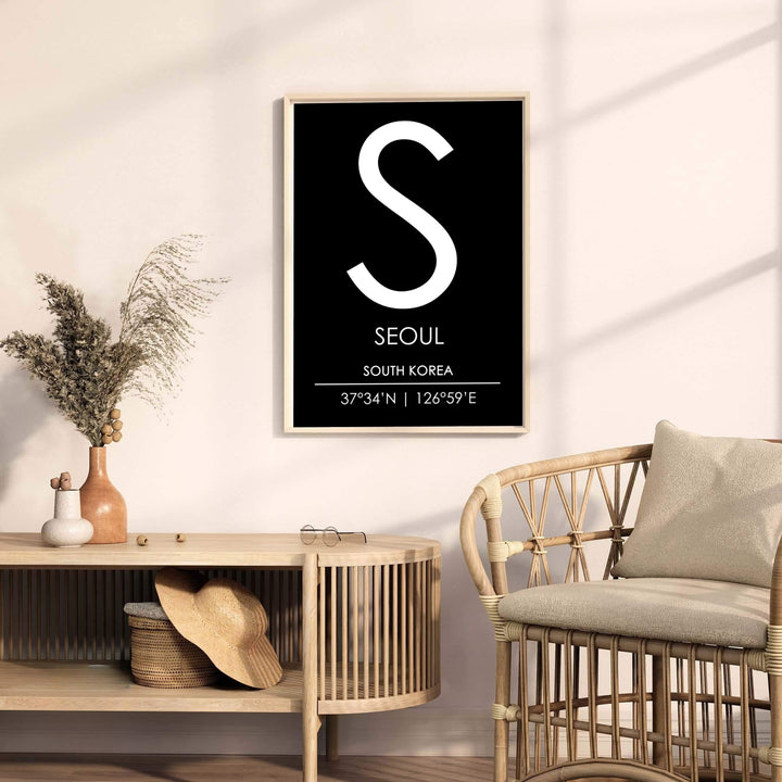Captivating black and white seoul initial monogram print detailing the capital coordinates of south korea, styled by MapYourDreams with flexible choices including unframed archival paper, dark wood frames, and gallery canvas formats engineered for enduring visual appeal.