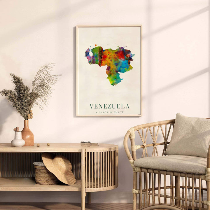 Beautiful South American landmark wall decor displaying the watercolor paint splash silhouette of Venezuela. Available through MapYourDreams, this print accommodates various display preferences, including unframed art paper, framed prints, or canvas wraps
