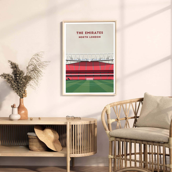 Contemporary fine art Emirates Stadium illustration print showing pitch perspective and red stand seating, available as unframed paper, framed picture art, or stretched canvas choices.