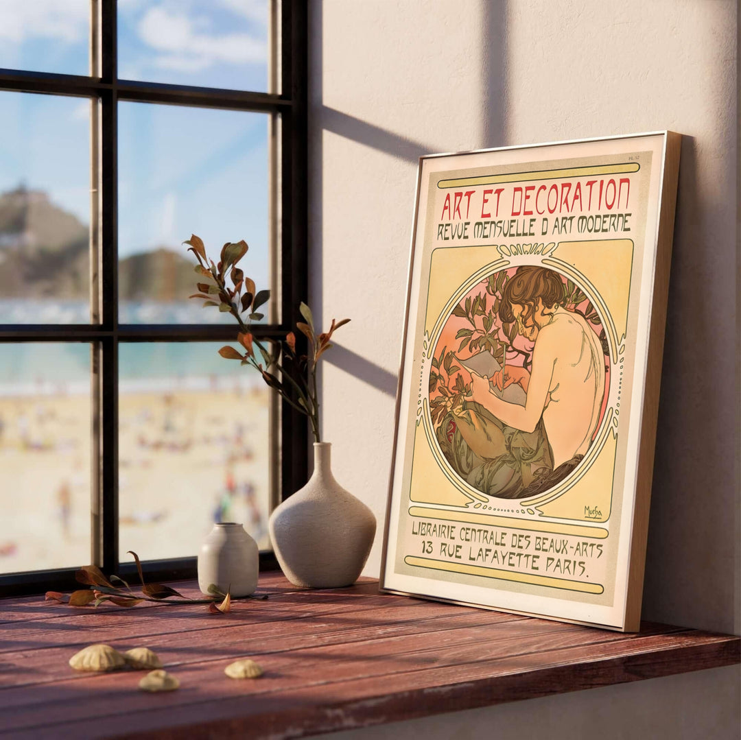 Vintage French magazine cover poster Art Et Decoration by artist Alphonse Mucha showing a maiden in a medallion at 13 Rue Lafayette Paris. Available as unframed prints, gallery canvas, or framed wall decor at MapYourDreams.