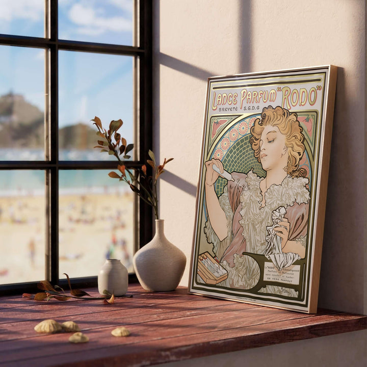 Classic Belle Époque portrait print Lance Parfum Rodo by artist Alphonse Mucha depicting a floral archway backdrop set in Paris France. MapYourDreams provides custom fine art framed, unframed, and canvas print formats.