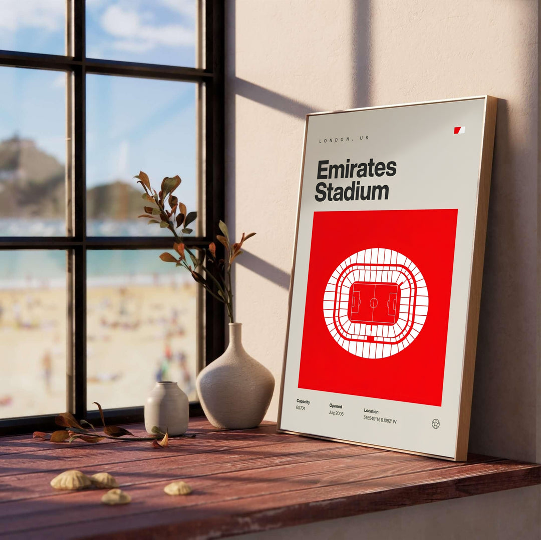Minimalist red and cream vector blueprint print showcasing the aerial seating layout and field coordinates of Emirates Stadium in North London. Created by MapYourDreams, this landmark print is offered as an unframed fine art paper print, custom wooden framed setup, or floating canvas wall display.