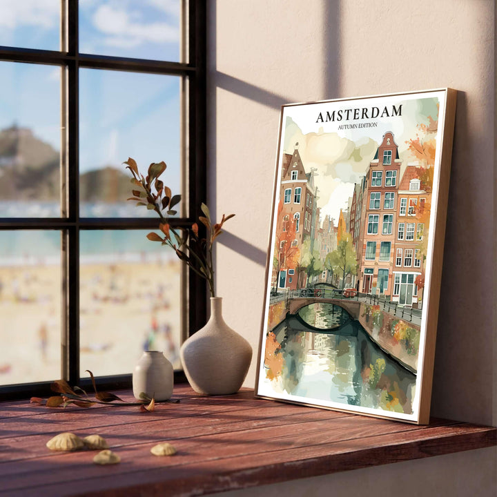 Vibrant watercolor canal poster displaying glowing orange fall leaves and historic Dutch townhouses in Amsterdam, created by MapYourDreams with product options spanning unframed archival prints, museum canvas decor, and custom frame options in black, white, and natural wood finishes.