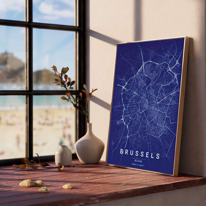 Sleek geographic poster capturing the detailed street grid and latitude-longitude coordinates of Brussels, Belgium, with modern white bottom typography. Offered by MapYourDreams, this artwork is available in flexible options including unframed paper, custom wooden frames, and gallery canvas wraps.