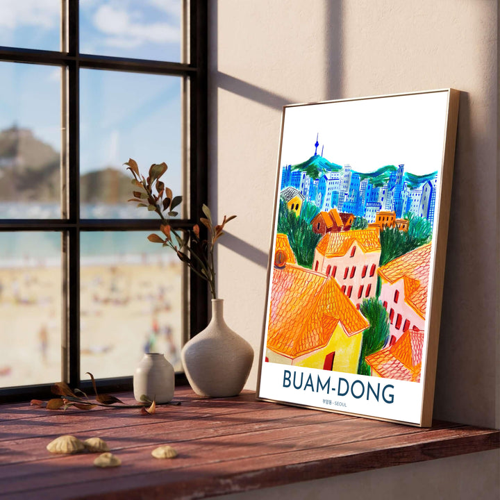 Whimsical colored pencil skyline artwork of Buam-dong in Seoul, South Korea, highlighting glowing orange house roofs in the foreground and blue urban high-rises under Namsan Tower. Offered by MapYourDreams, this artwork is available in flexible options including unframed paper, custom wooden frames, and gallery canvas wraps.