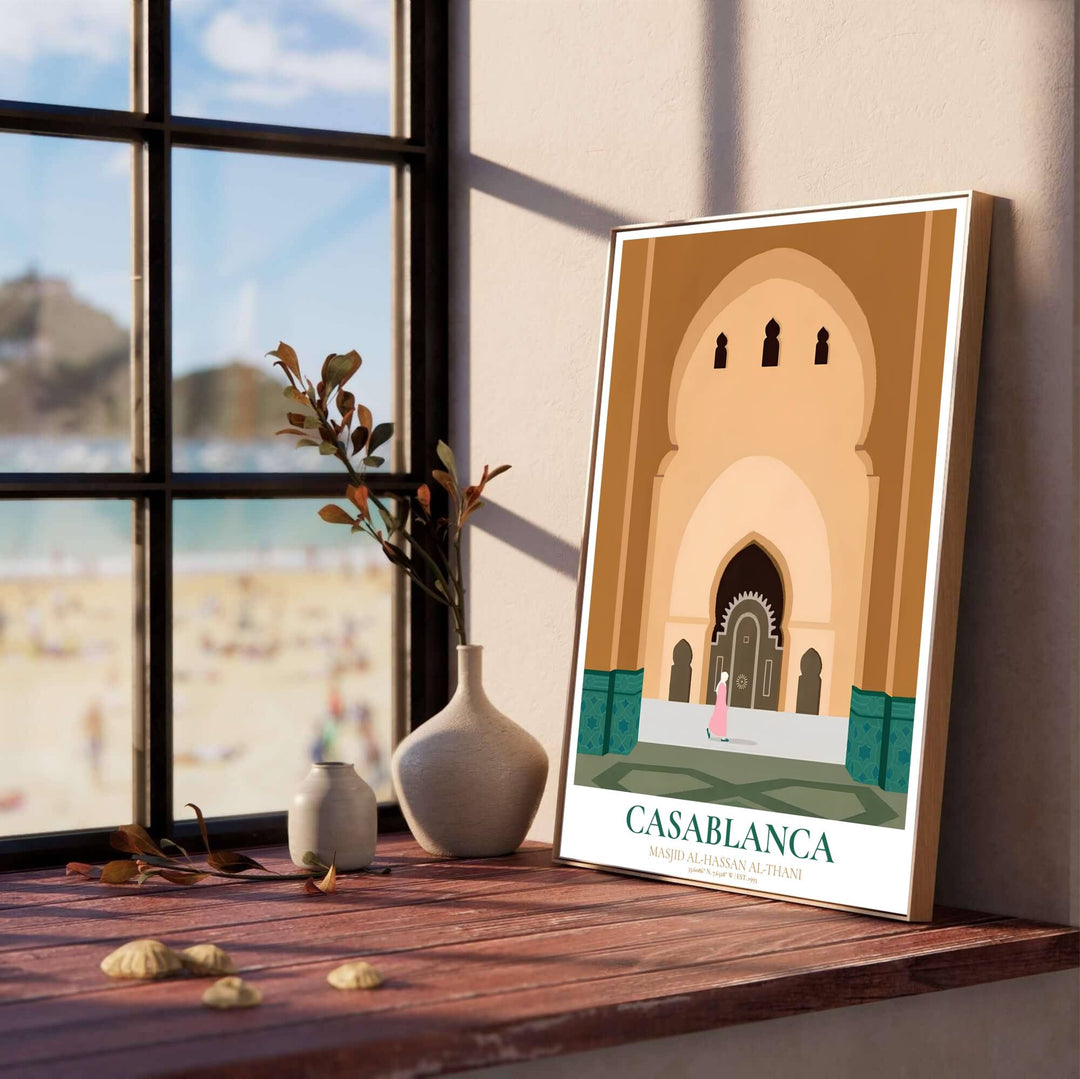 Modern Moroccan travel print of the iconic Hassan II Mosque in Casablanca featuring green zellij tilework borders and elegant typography. Designed by MapYourDreams, this artwork is available in flexible options including unframed paper, custom wooden frames, and gallery canvas wraps for home wall art.