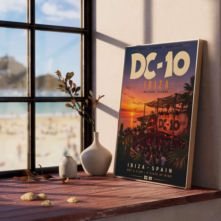 Balearic sunset art print displaying warm evening lighting and crowded dance floor under open structure at DC-10 in Ibiza, Spain, provided by MapYourDreams where buyers can order an unframed paper poster, gallery wrapped canvas print, or custom framed wall decor.