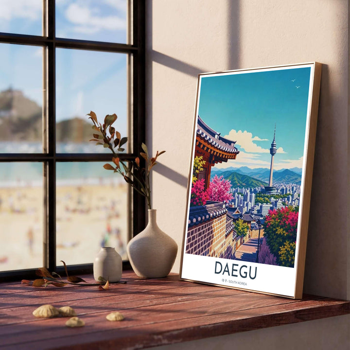 Colorful urban skyline print of Daegu, South Korea, featuring a sunny alleyway with stone lattice walls, bright pink blossoms, and the iconic 83 Tower in the distance. Offered by MapYourDreams, this artwork is available in flexible options including unframed paper, custom wooden frames, and gallery canvas wraps.