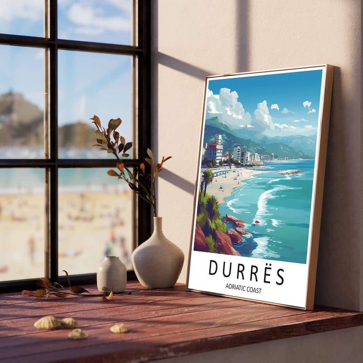 Soft white clouds float over the turquoise ocean and sandy shoreline of Durrës, accented by dark typography reading Durrës Adriatic Coast. Available through MapYourDreams with display choices like unframed paper stock, custom frames, and stretched canvas.