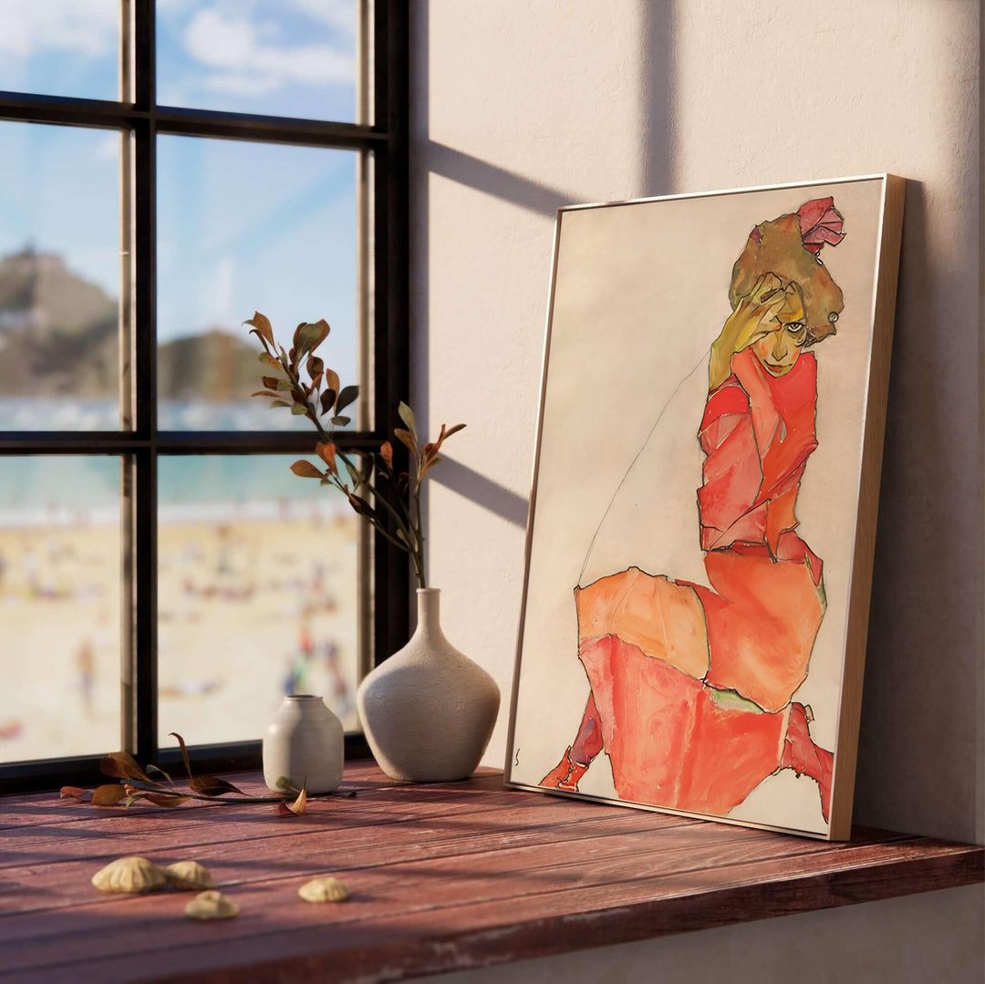 Vintage museum figure poster of Egon Schiele Kneeling Female In Orange Red Dress 1910 at Leopold Museum Vienna rendered with authentic warm cream background paper. Select custom framed wall art, unframed paper poster prints, or gallery canvas formats at MapYourDreams for a refined office wall decoration focus.