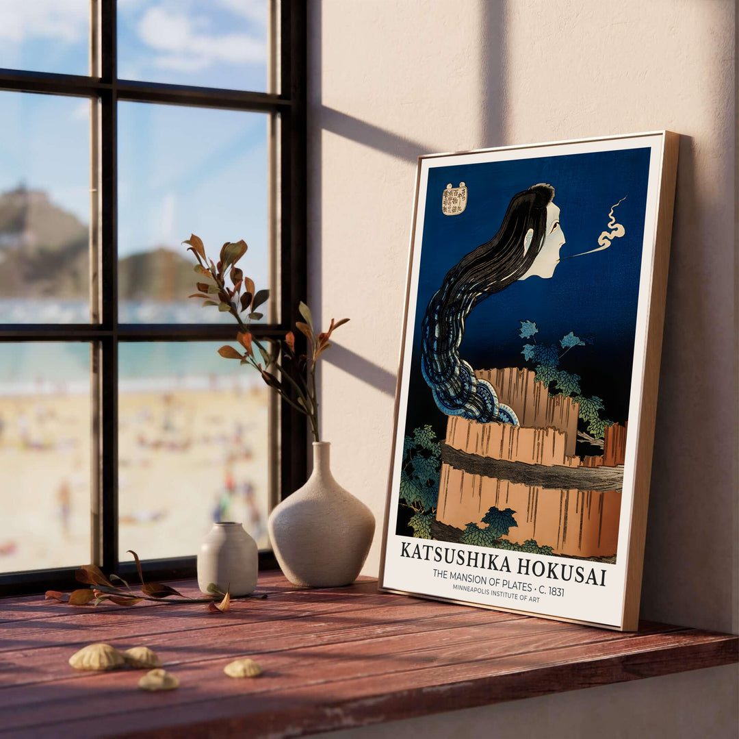 Dramatic dark background yurei print of The Mansion of Plates by artist Katsushika Hokusai inspired by 1831 folklore in Minneapolis for living room wall decor. Select custom framed, unframed poster, or gallery canvas choices at MapYourDreams.