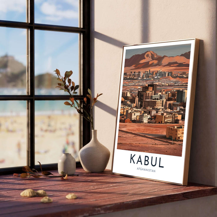 Terracotta tone urban landscape print of Kabul Afghanistan capturing city buildings and surrounding desert mountains, offered by MapYourDreams with selection options for an unframed paper print, ready to hang canvas wall art, or custom framed poster in grey, bronze, and gold frame finishes.