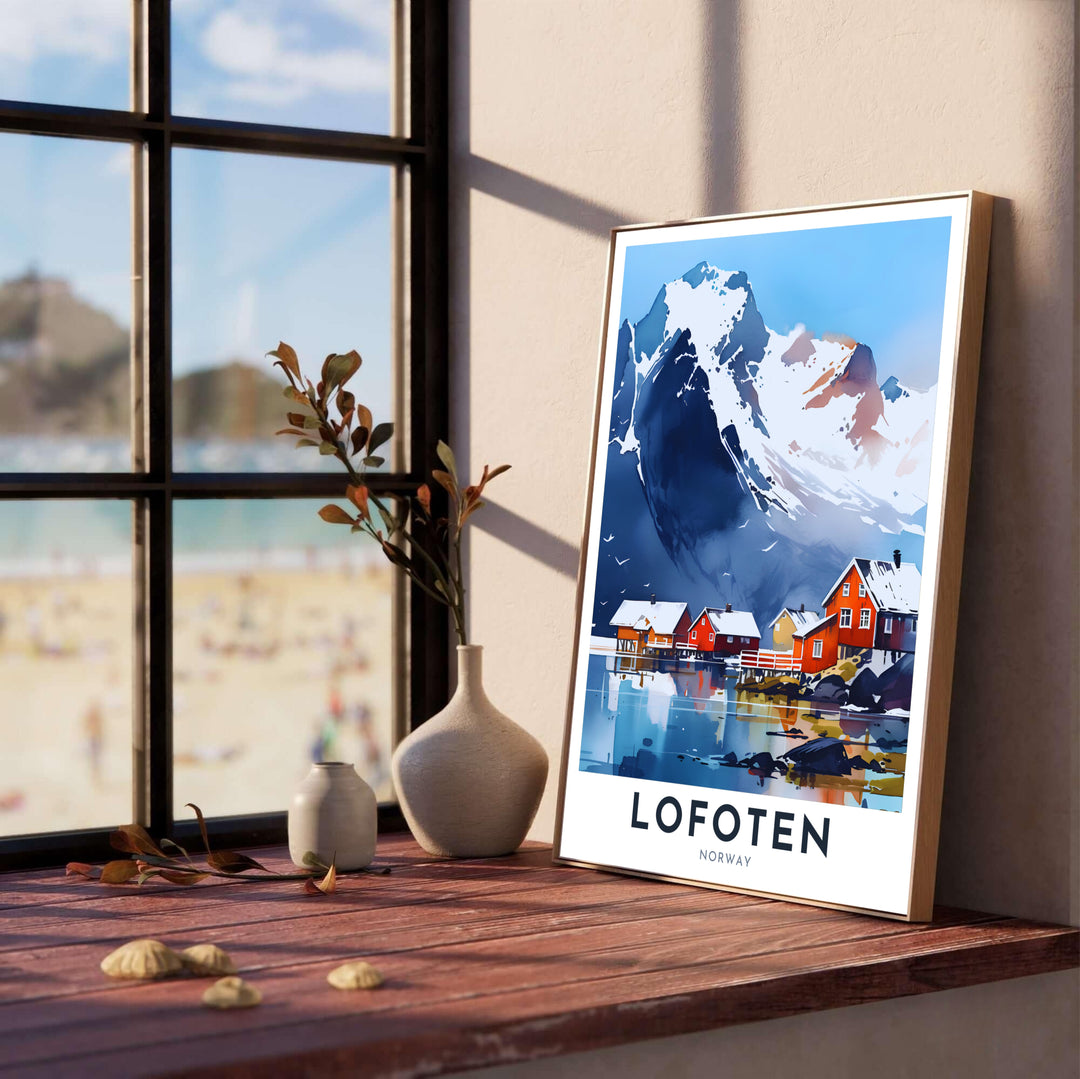 Atmospheric watercolor travel poster capturing snowy mountain heights and red rorbuer dwellings along the blue waters of Lofoten Norway. Produced by MapYourDreams, this nature artwork provides options such as sleek framed displays, unframed paper prints, and textured gallery wrapped canvas artwork.