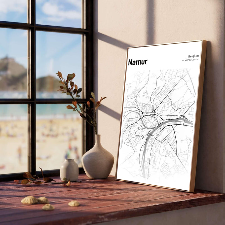 Minimalist black line vector map poster of Namur, Belgium, set against a pristine white backdrop for modern office or home interior wall decoration. Offered by MapYourDreams, this artwork is available in flexible options including unframed paper, custom wooden frames, and gallery canvas wraps.