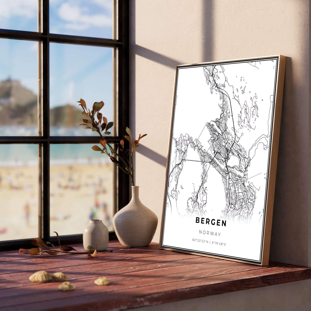 Contemporary graphic street grid map poster highlighting the coastal geography and city layout of Bergen Norway. Produced by MapYourDreams, this cartographic decor provides flexible options such as sleek framed displays, unframed paper prints, and textured gallery wrapped canvas artwork.