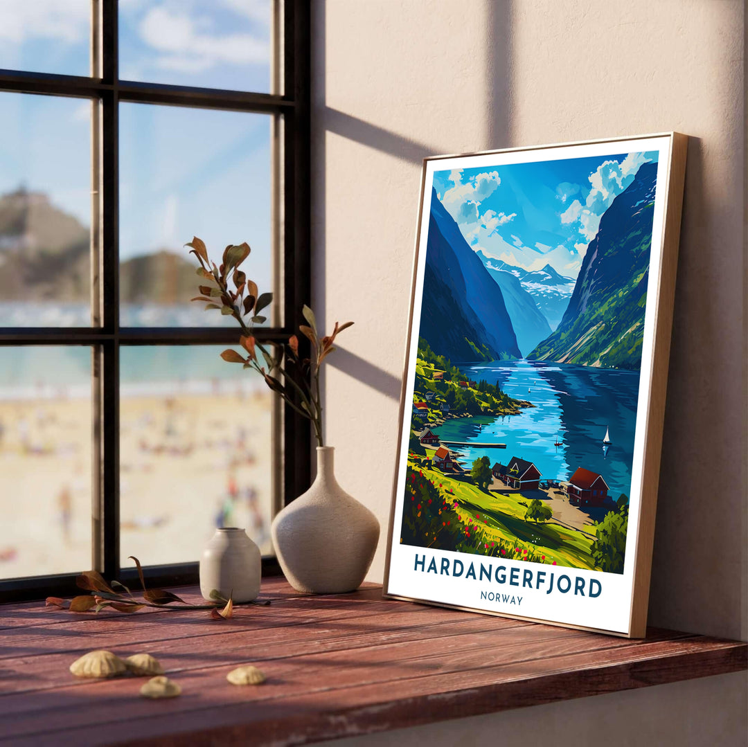 Majestic summer landscape print depicting Hardangerfjord Norway with bright red houses, wooden docks, and sailboats under a blue sky. Enhance your living room layout with this artwork, available as a ready-to-display framed poster, gallery wrapped canvas print, or classic unframed poster.