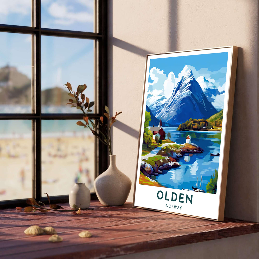 Scenic artwork showing the coastal village of Olden along Nordfjord with towering glacier mountains under a bright blue sky filled with clouds. Created by MapYourDreams, this mountain landscape print is available as an unframed art paper option, solid wood framed print, or floating canvas wall display.