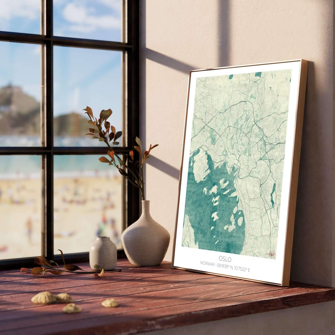 Vintage nautical map illustration featuring the urban street grid of Oslo Norway in teal blue and seafoam ocean tones over antique paper. Created by MapYourDreams, this map artwork is offered as an unframed fine art paper print, custom wooden framed setup, or floating canvas wall display.