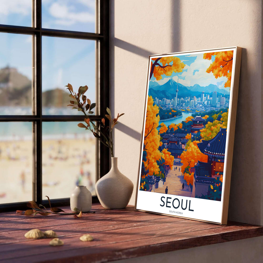 Atmospheric South Korea poster showcasing autumn colors in Seoul, with dark wooden Hanok architecture nestled amidst fiery orange leaves, leading to the blue Han River and N Seoul Tower under a bright cloudy sky. Offered by MapYourDreams, this artwork is available in flexible options including unframed paper, custom wooden frames, and gallery canvas wraps.