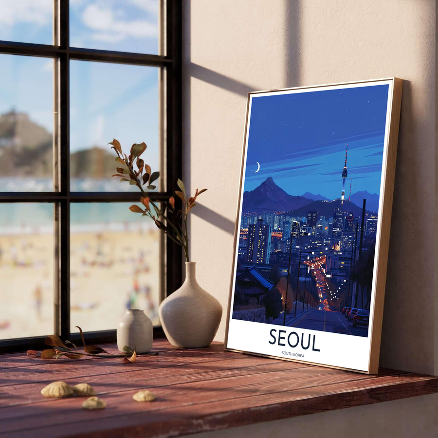 Panoramic night travel wall art showcasing the glowing N Seoul Tower and distant city skyline under a twilight blue sky, created by MapYourDreams across options like archival unframed prints, solid frames, and canvas wraps that bring sophisticated nocturnal charm to any gallery wall.