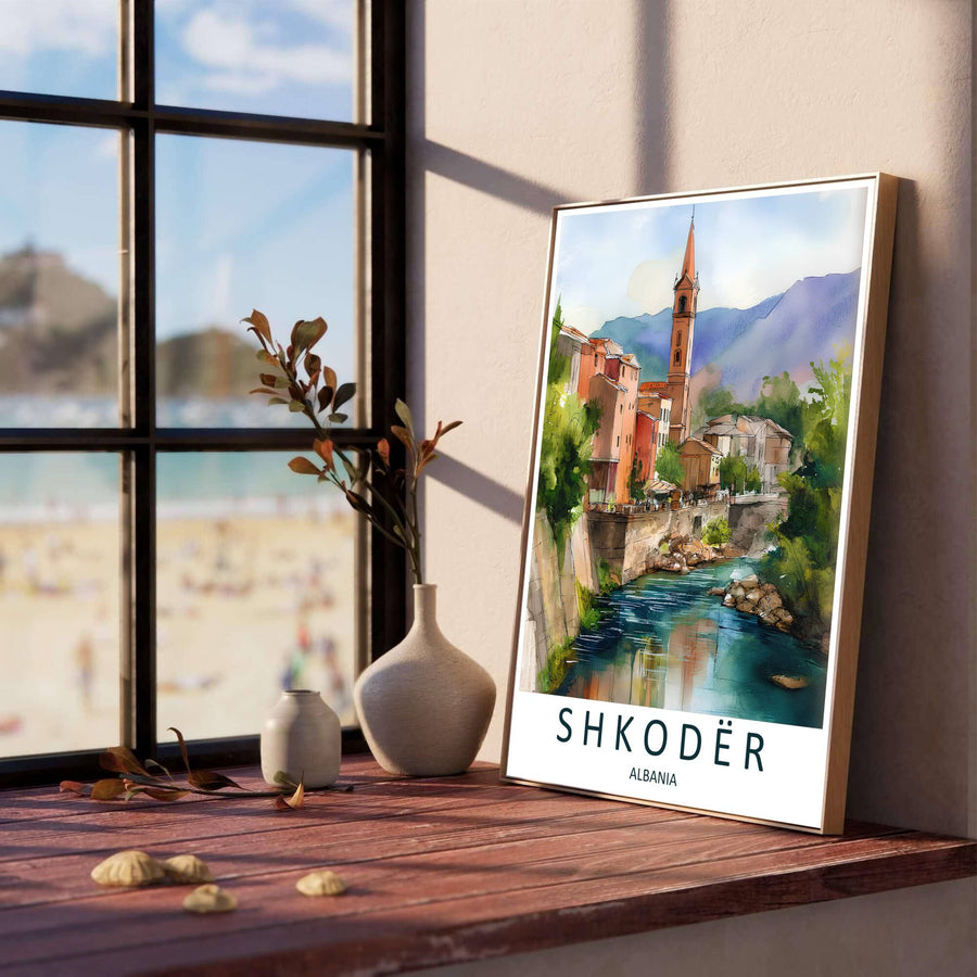 Soft cyan and warm terracotta watercolor washes illustrate the serene riverbanks of Shkodër, creating a classic European travel poster for living rooms or bedrooms. Offered in versatile formats including unframed art paper, custom wood framing, and stretched canvas wraps to elevate your space.