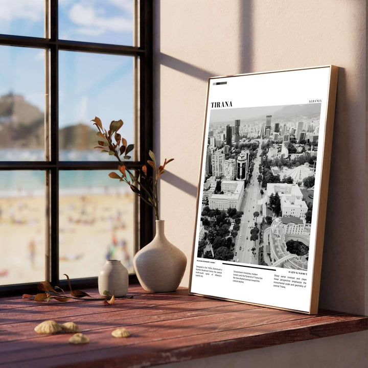 High-contrast Black &amp; White photo tones highlight the monumental scale of Dëshmorët e Kombit Boulevard, creating a classic European urban travel poster for modern living rooms. Offered in versatile formats including unframed art paper, custom wood framing, and stretched canvas wraps to elevate your space.
