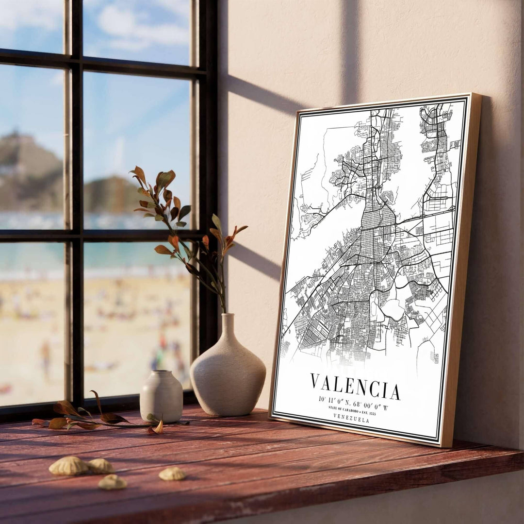 Monochrome South American city map poster depicting primary highways, secondary avenues, and coordinates for Valencia, Venezuela. Created by MapYourDreams, this artwork is adaptable for any interior in unframed prints, solid wooden frames, or gallery canvas wraps.