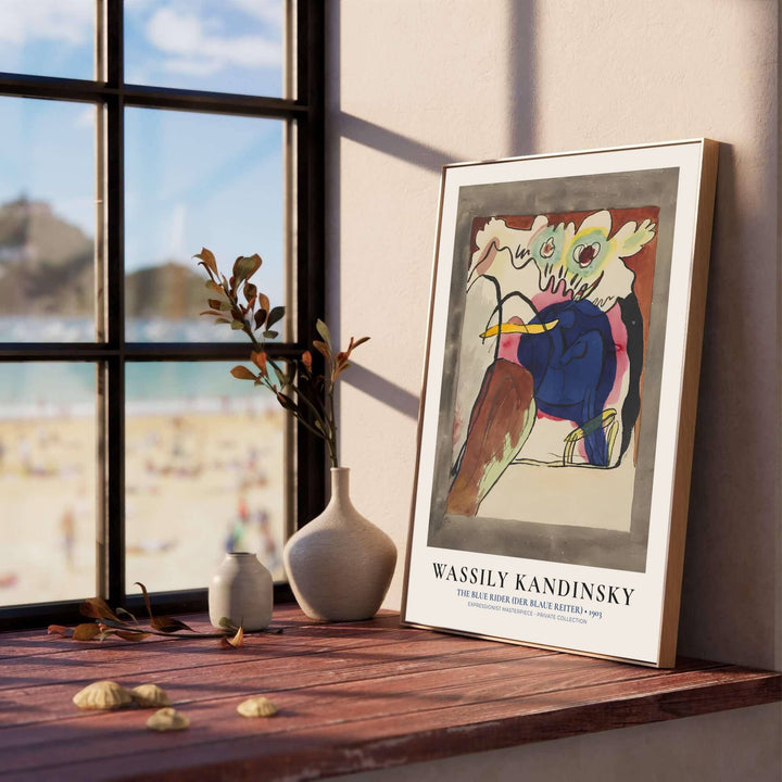 Celebrated for its revolutionary departure from strict academic realism, this Wassily Kandinsky The Blue Rider wall art showcases timeless modernist elegance that enhances contemporary living environments. MapYourDreams provides this exquisite piece in a variety of presentation styles, allowing buyers to choose between minimalist unframed posters, elegant wood frames, and textured canvas options that elevate any room.