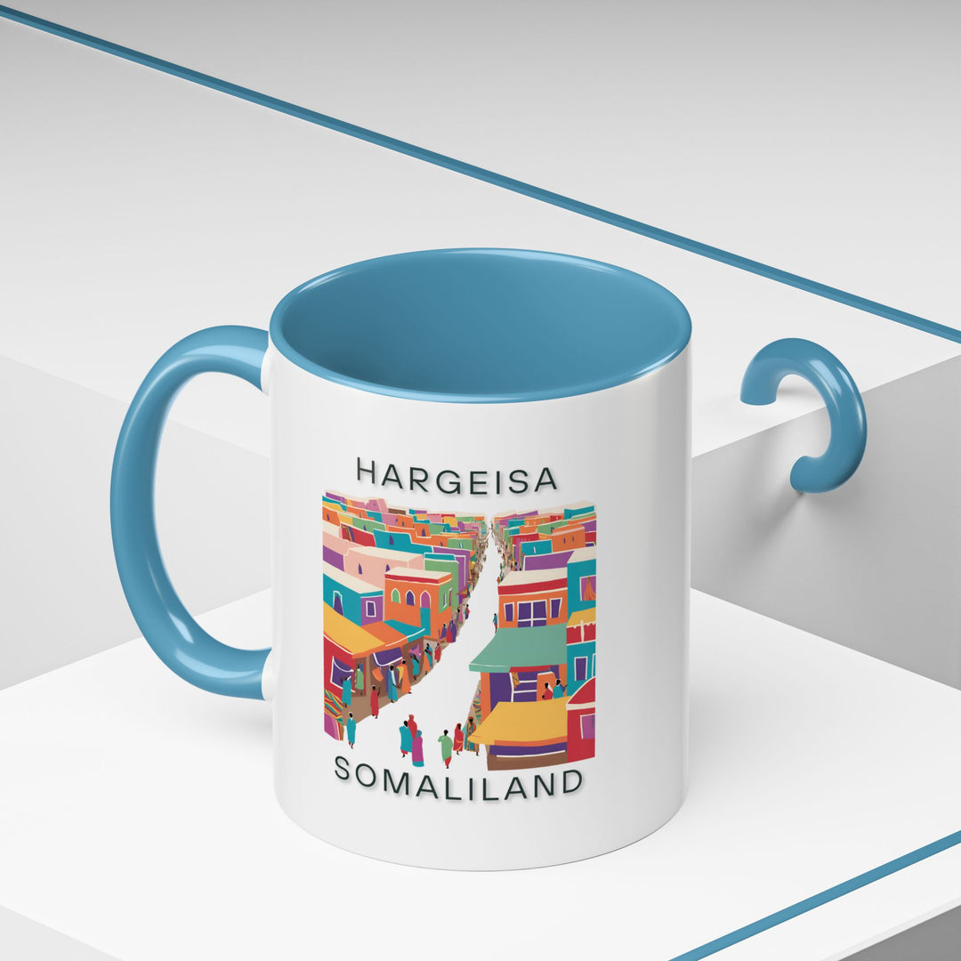 This Hargeisa mug blends artistic beauty with practicality. Featuring vibrant designs inspired by the city, it is dishwasher-safe and made from durable ceramic, making it perfect for coffee or tea lovers. A great gift for collectors.