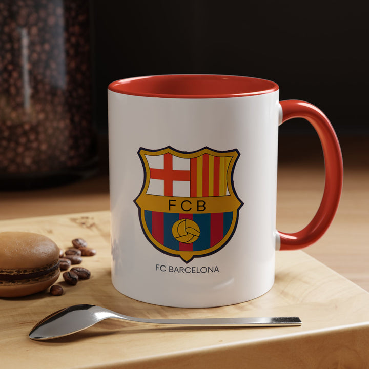 A beautifully designed FC Barcelona mug celebrating the club’s legacy. Perfect for coffee or tea lovers, it features intricate artwork inspired by FC Barcelona’s crest. Durable and dishwasher-safe, it makes a thoughtful gift or keepsake for football fans and collectors.