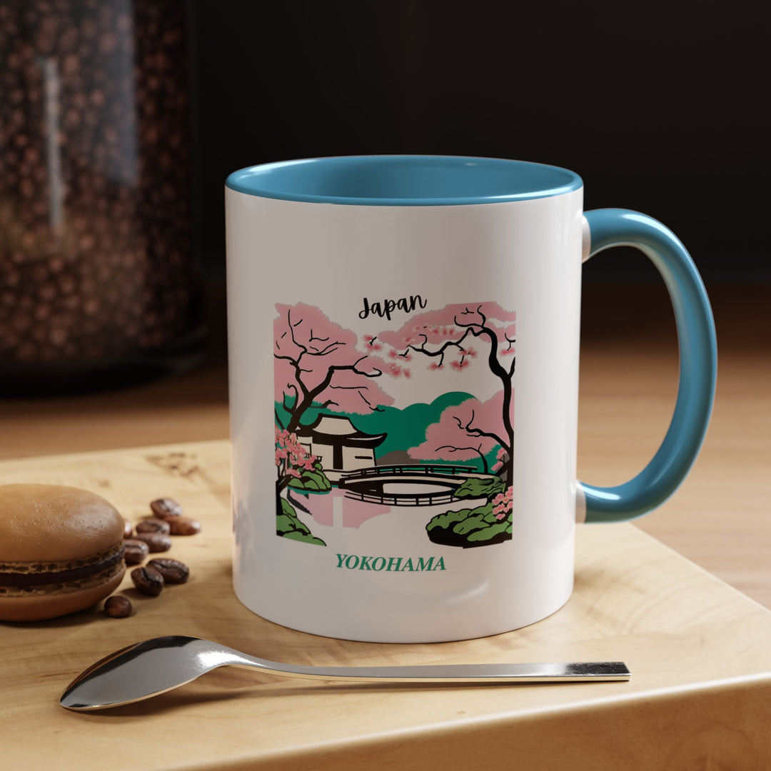 Experience the allure of Yokohama with this elegantly designed Japan mug. Ideal for coffee and tea lovers, showcasing artwork inspired by Yokohamas historic landmarks. Dishwasher and microwave safe, this mug is a thoughtful gift or keepsake for travelers and culture enthusiasts.