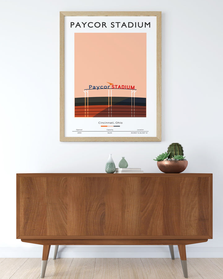 A stunning depiction of Paycor Stadium in Cincinnati this vintage NFL print is a great football fan gift featuring the Bengals top players Joe Burrow and Joe Mixon ideal for adding a retro NFL touch to any living room or man cave