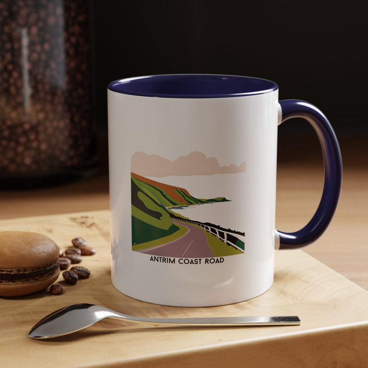 Enjoy the beauty of the Antrim Coast Road with this ceramic mug featuring stunning coastal artwork. Dishwasher and microwave safe, it is both durable and stylish, ideal for coffee enthusiasts or as a thoughtful gift for Irish landscape lovers.