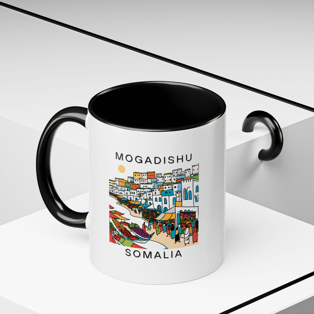 A delightful Mogadishu Somalia mug that showcases the beauty of the city. Made from durable ceramic, this mug is perfect for coffee or tea lovers and makes a thoughtful, practical gift for anyone who loves Somali culture and landscapes.