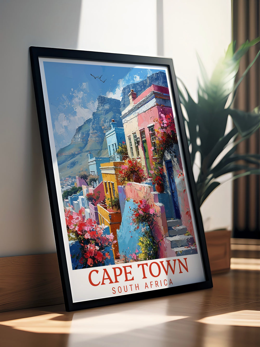 Cape Town wall art featuring the iconic Table Mountain paired with the vibrant streets of Bo Kaap. A striking retro travel poster that celebrates the beauty of South Africa. Perfect for living room decor or as a gift for those who love nature and culture.