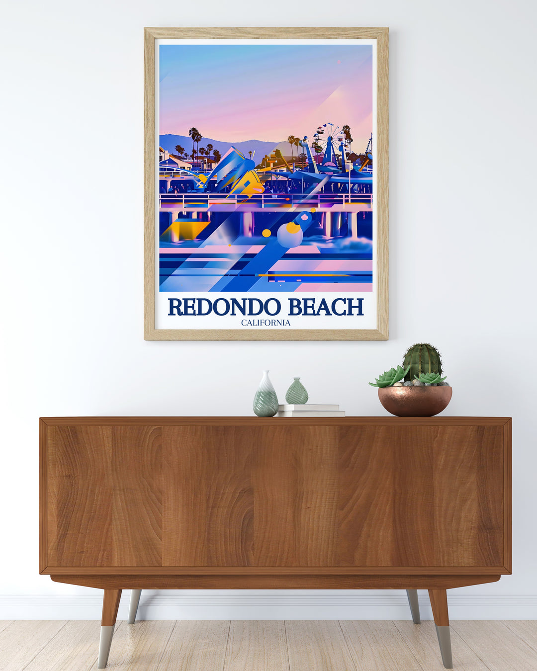 Redondo Beach travel print illustrating the vibrant scenes of the Redondo Beach Pier and Redondo Arcade, offering a perfect blend of coastal beauty and playful fun. This wall poster is a must have for those who want to bring the spirit of the California coast into their home.