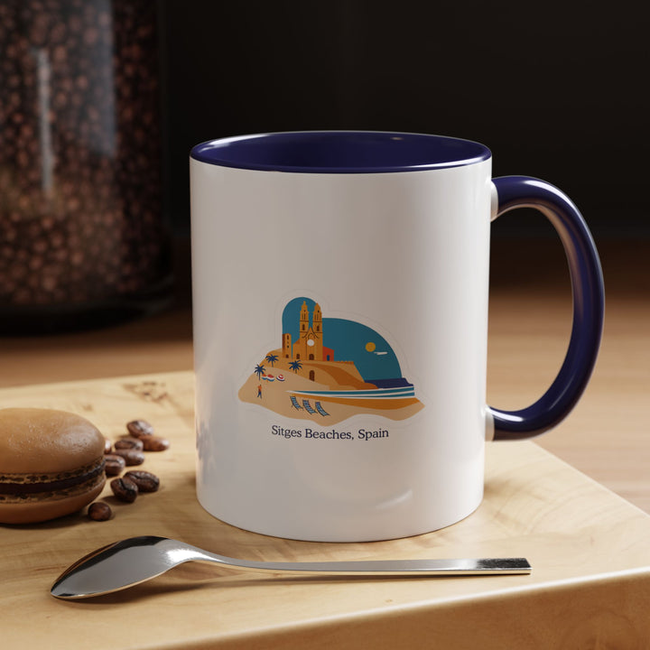 The Sitges Beach Spain Mug is a premium ceramic piece adorned with colorful artwork inspired by Sitges’s scenic beaches. Dishwasher safe and durable, it is perfect for coffee or tea lovers and makes a unique keepsake.