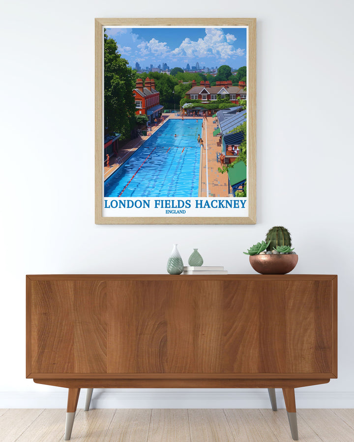 This travel poster beautifully depicts the serene beauty of London Fields and the iconic London Fields Lido, ideal for adding a touch of Hackneys charm to any room.
