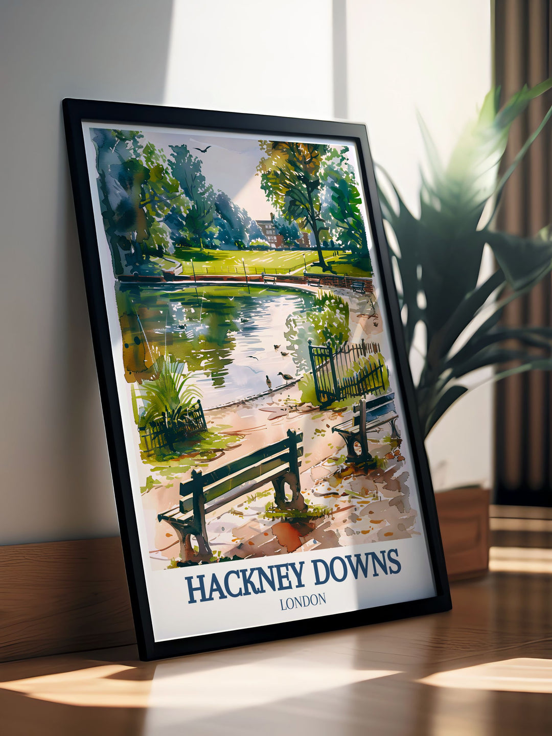 Showcasing the tranquil beauty of Hackney Downs, this travel poster captures the serene and inviting atmosphere of one of Londons cherished parks, bringing a piece of its charm into your home.