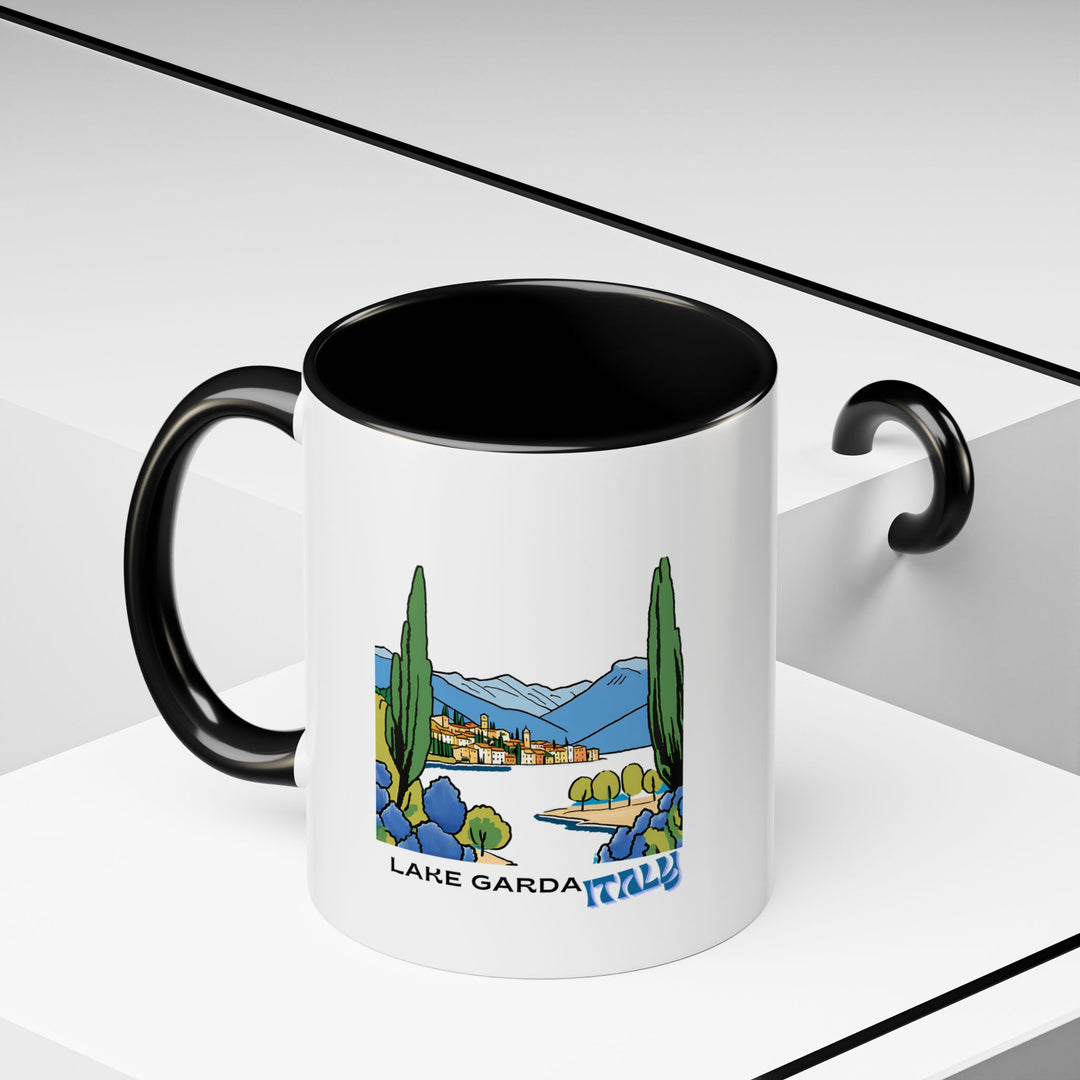 A charming mug that showcases the scenic views of Lake Garda in Italy. With its durable ceramic material and vivid print, it is the ideal gift for coffee and tea lovers who have visited or dream of visiting Italy’s picturesque lakeside.