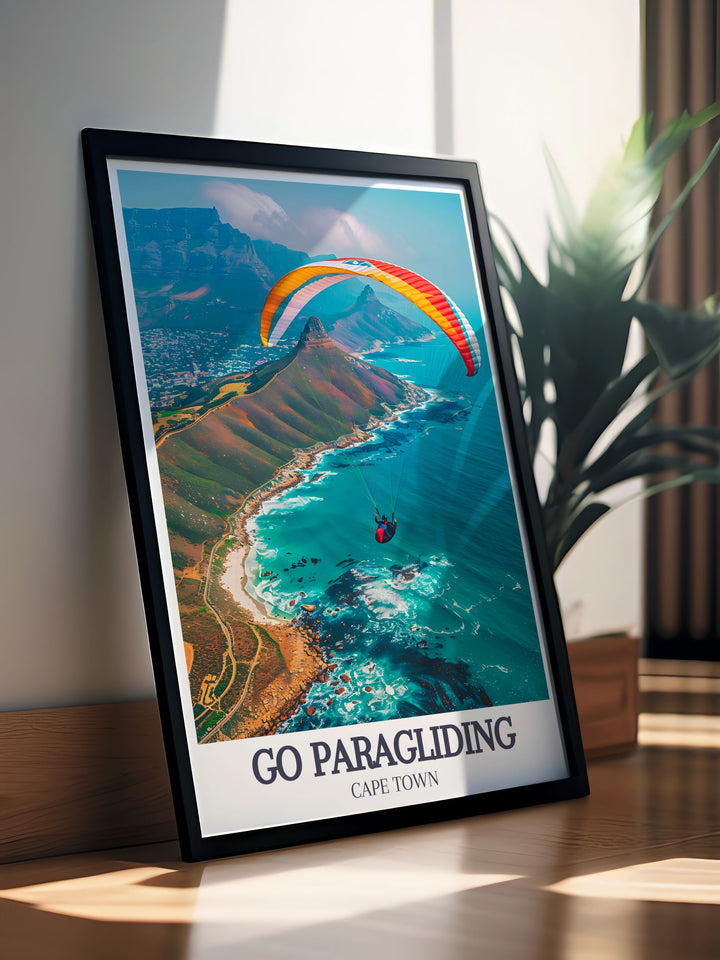 The Go Paragliding Poster Print showcases an exhilarating view of Cape Town and Table Mountain from above, capturing the breathtaking essence of outdoor adventure sports like paragliding and hang gliding. This travel print brings the thrill of flight to your living space.