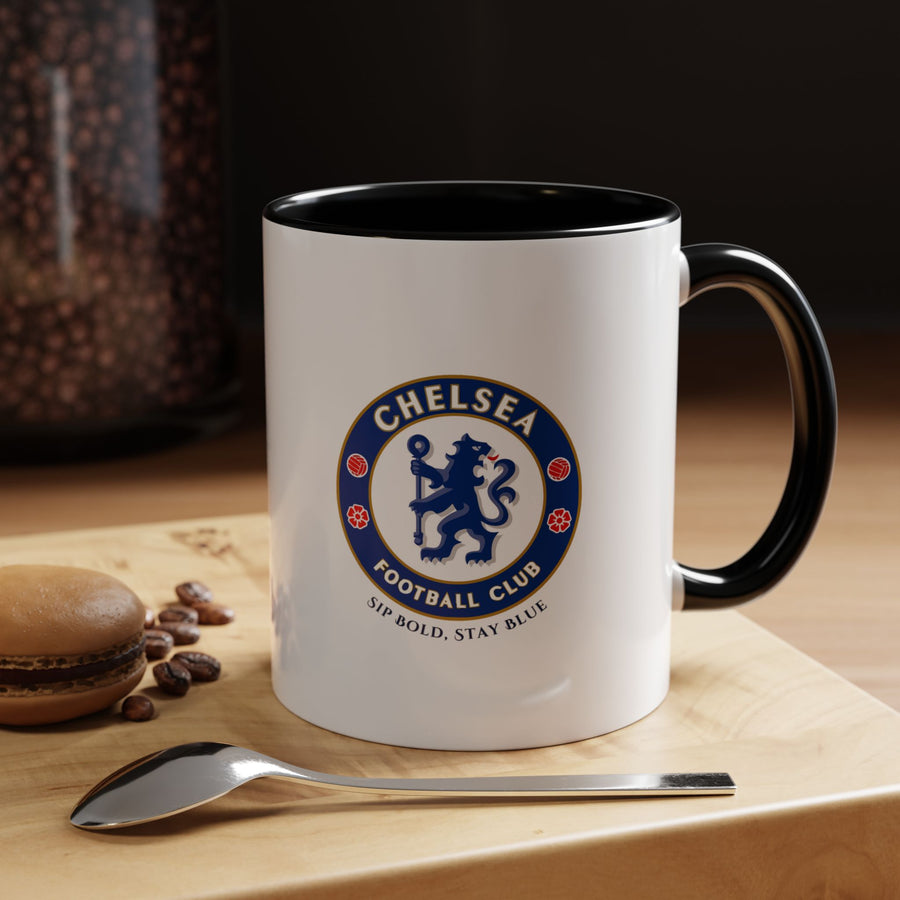 Black Chelsea FC ceramic mug featuring the club logo. Ideal for coffee, tea, or hot chocolate, this sleek and modern mug is perfect for home, office, or gifting. Durable and stylish, it allows fans to showcase loyalty to the Blues subtly while enjoying their favorite beverages.