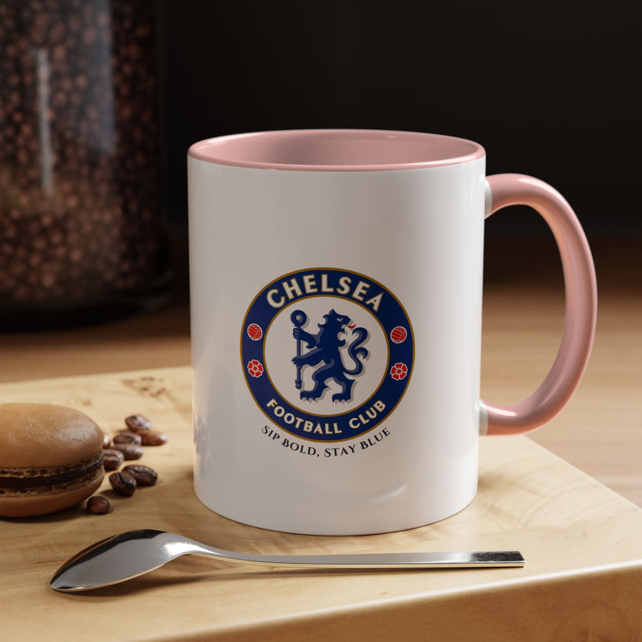 Chelsea FC ceramic mug in pink featuring the club logo, combining functionality with playful style. Ideal for enjoying coffee, tea, or hot chocolate while showing team pride, this mug makes a thoughtful gift for fans and a bright addition to any collection of official club merchandise.