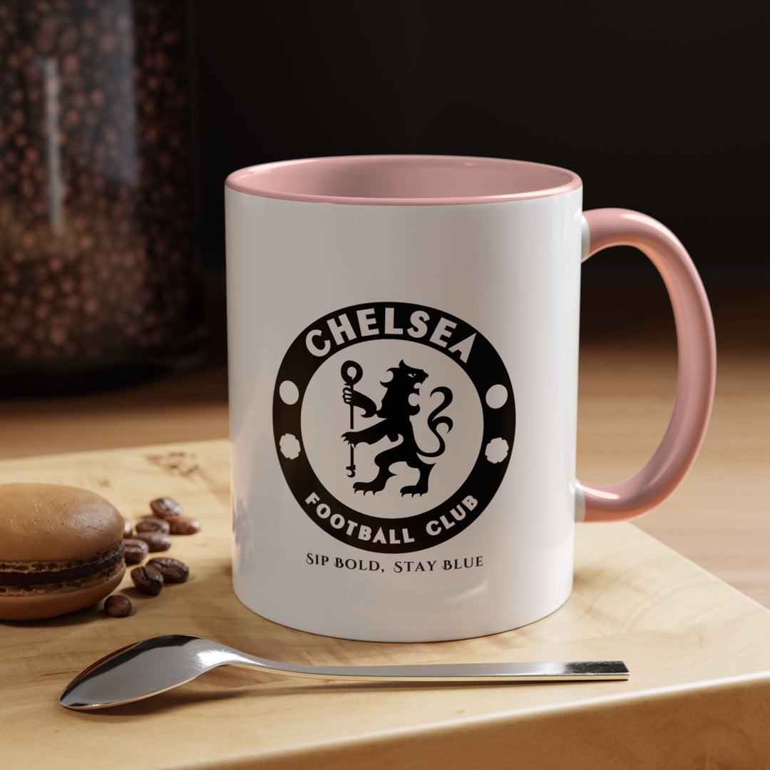 Pink Chelsea FC ceramic mug designed for fans who enjoy playful, colorful merchandise. Perfect for coffee, tea, or hot chocolate, this fan mug combines durability with eye-catching design, making it an excellent gift or addition to any Chelsea supporter’s collection of official club merchandise.