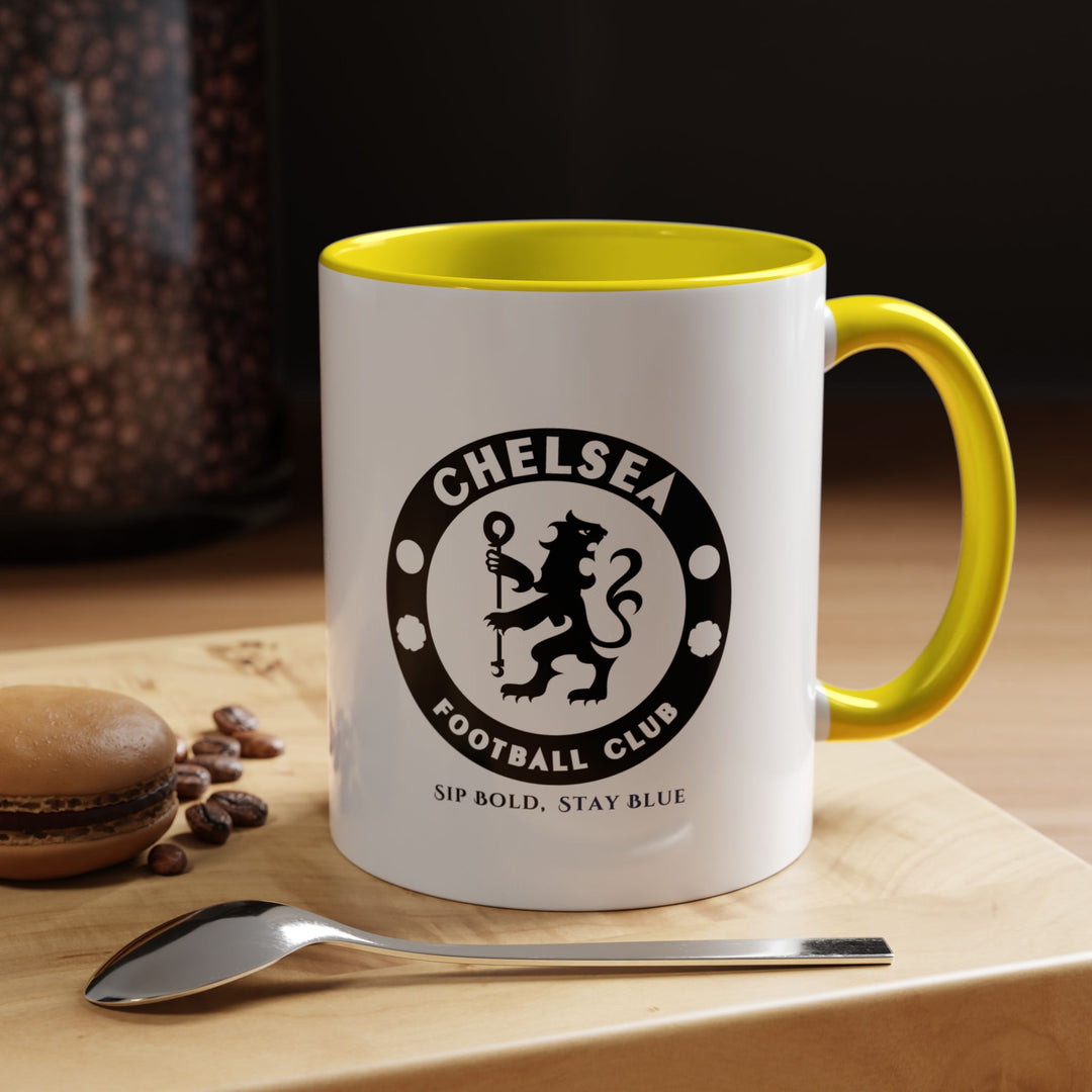 Bright yellow Chelsea FC fan mug in ceramic, ideal for coffee, tea, or hot beverages. Durable and stylish, this mug brings vibrant energy to everyday routines, game-day rituals, or fan collections. A perfect gift for any Blues supporter who wants to show off team pride with a practical drinkware piece.
