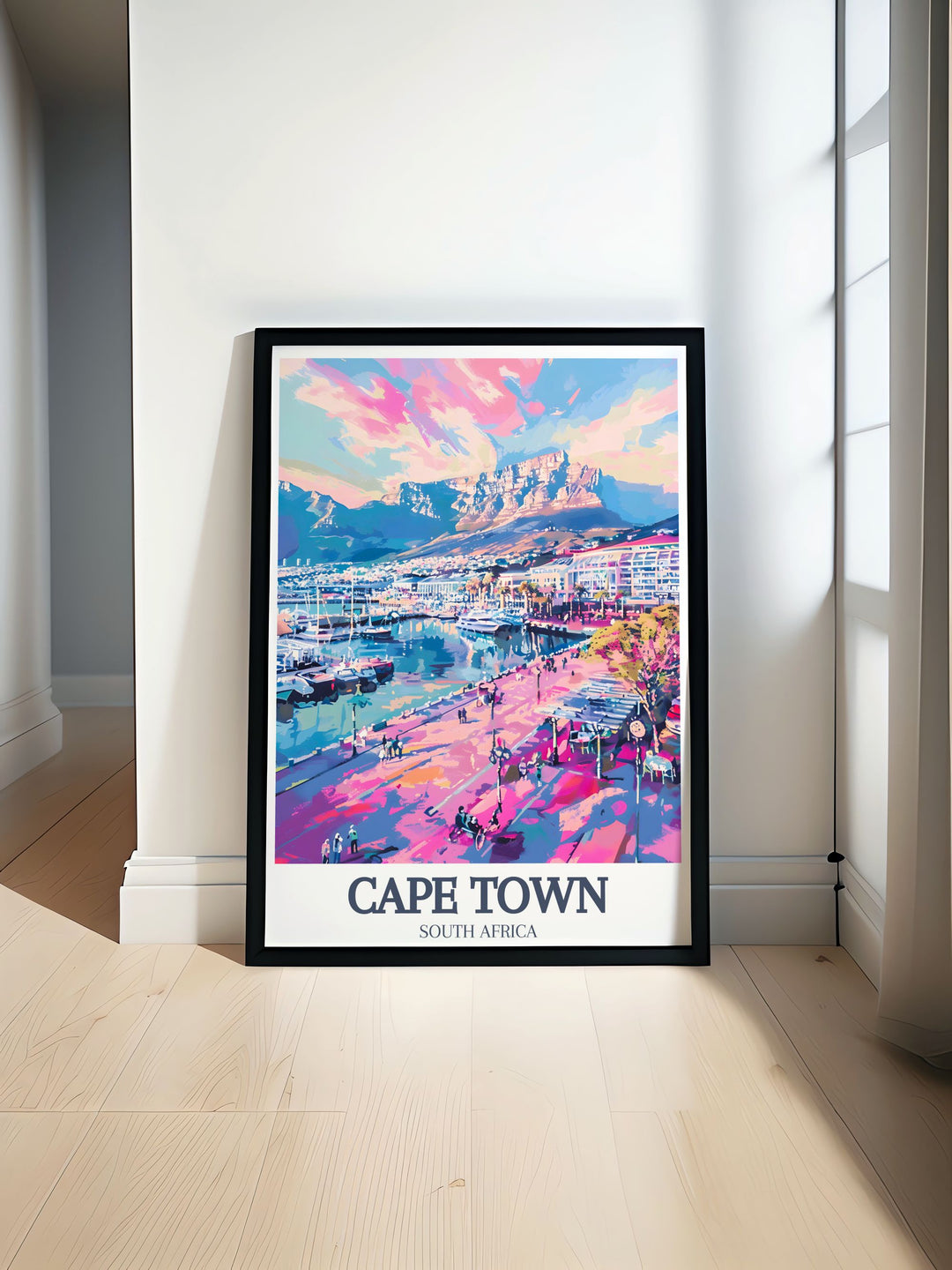 Cape Town Wall Art features both the iconic Table Mountain and the bustling Victoria and Alfred Waterfront. This framed art piece offers a captivating view of Cape Towns best known landmarks, ideal for enhancing any space with South African charm.