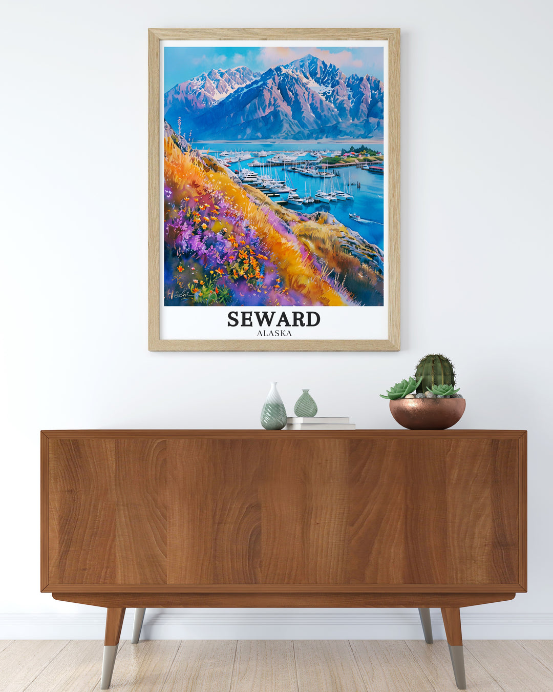 Striking Seward poster illustrating the dramatic Kenai Mountains and the bustling Seward Harbor. The print celebrates the unique blend of wilderness and community that defines Seward, making it a cherished piece for any lover of Alaska art