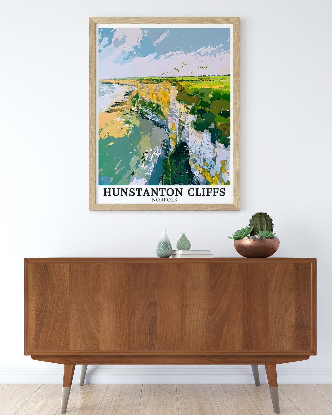 Hunstanton Cliffs travel poster offering a detailed view of one of Englands most iconic natural landmarks. This print captures the stunning layers of the cliffs and the surrounding coastal landscape, perfect for adding a bold statement piece to your home décor.