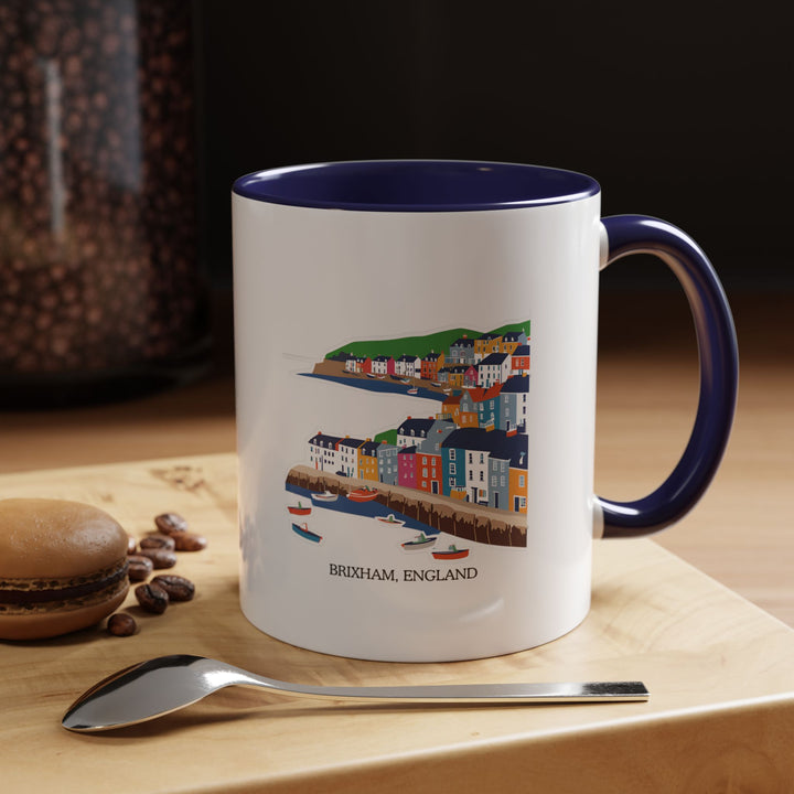 A beautifully designed Brixham England mug showcasing the charm of the town’s coastal views. Perfect for coffee and tea lovers, it features vibrant artwork inspired by Brixham’s harbors and landscapes. Dishwasher safe and microwave safe, it’s a meaningful gift or keepsake.