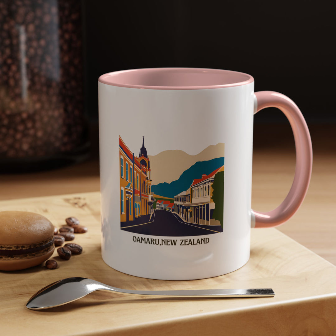 This Oamaru New Zealand mug combines artistic beauty with practical functionality. Featuring detailed artwork of Oamaru’s scenic beaches and charming architecture, it is made from high-quality ceramic, dishwasher safe, and perfect for coffee or tea lovers.